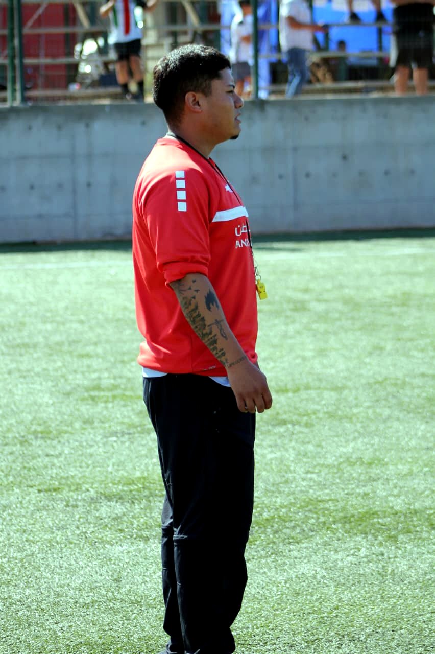 Cuerpo técnico en cancha - Escuela Oficial Palestino